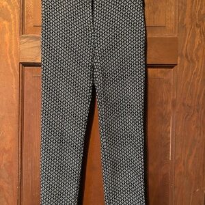 Women’s black, white and gold accent skinny pants